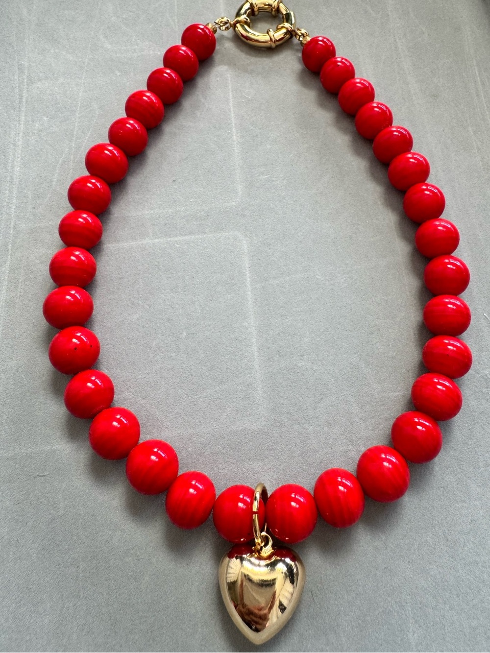 Elegant Red Beaded Necklace with Gold Heart Pendant